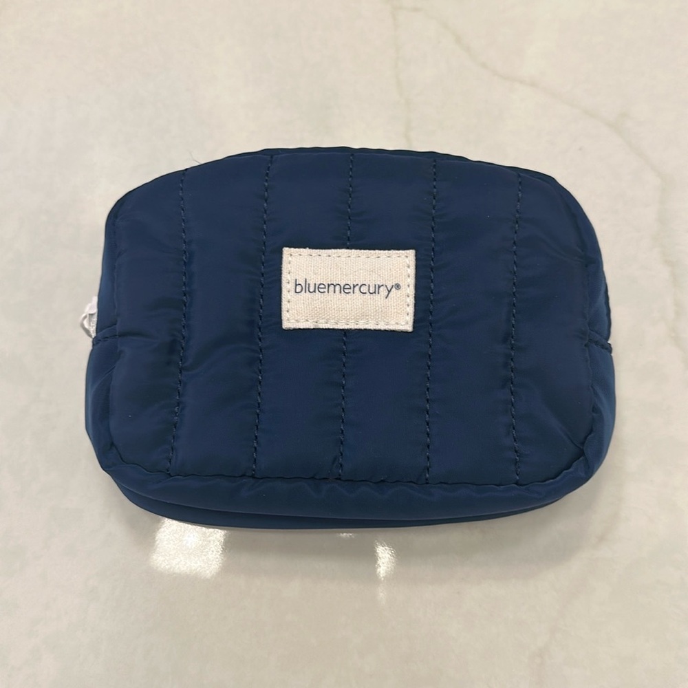 New/ unused. Blue Mercury Navy Blue Makeup bag